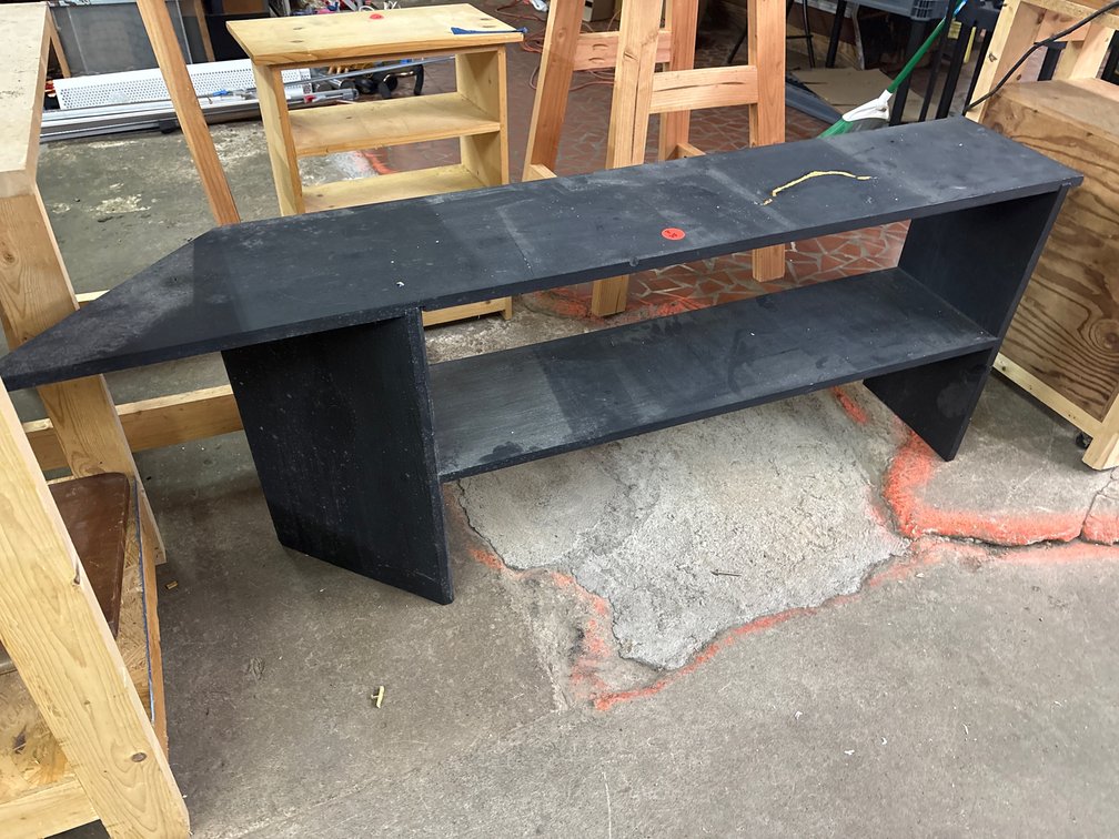 Black wood shelf unit.