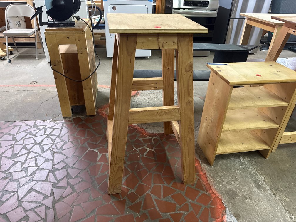 Tall wood stand.