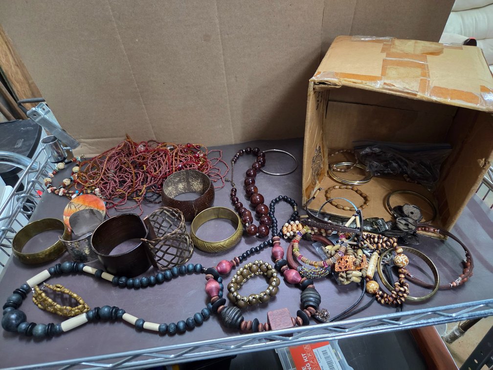 Metal bracelets & assorted necklaces