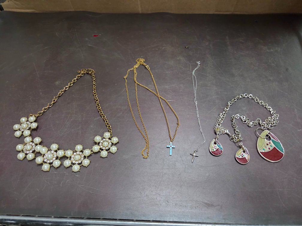 4 necklaces & a pair of earrings