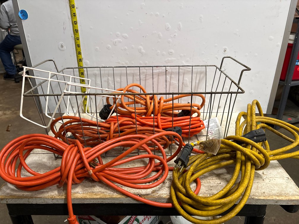 Extension cords in metal basket