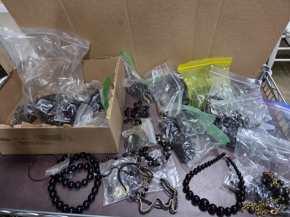 Assorted jewelry: mostly black