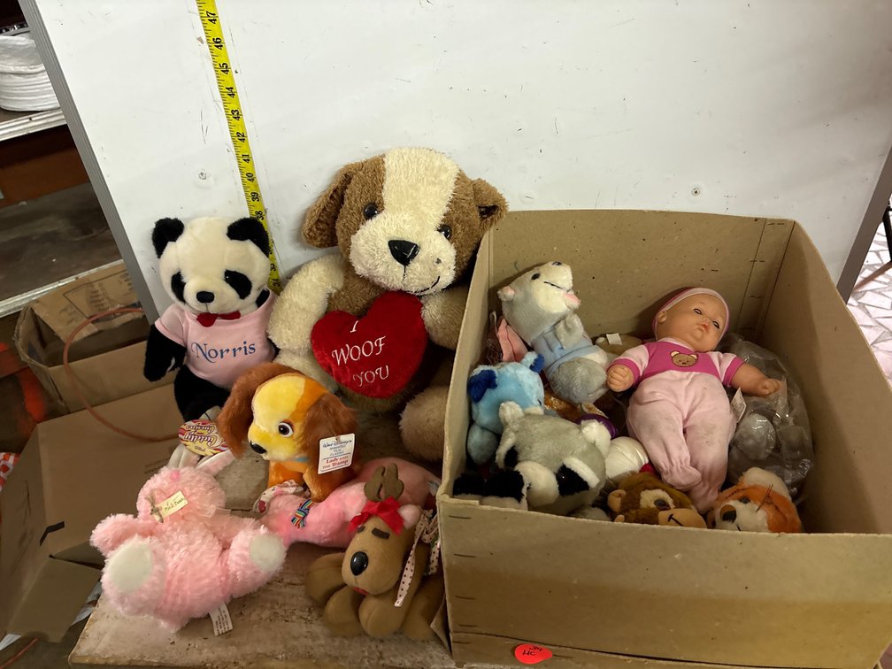 Box of plush animals & a doll