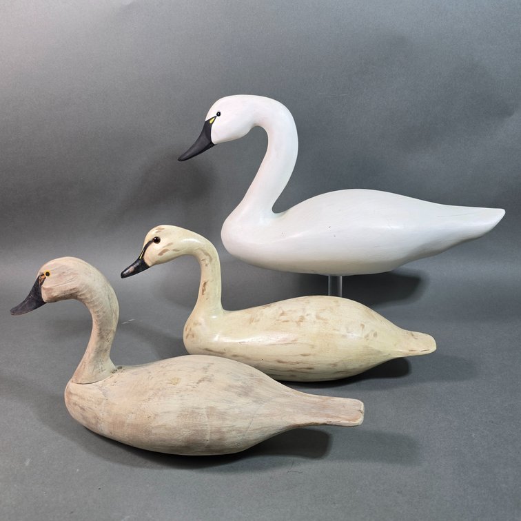 Three Carved Swans