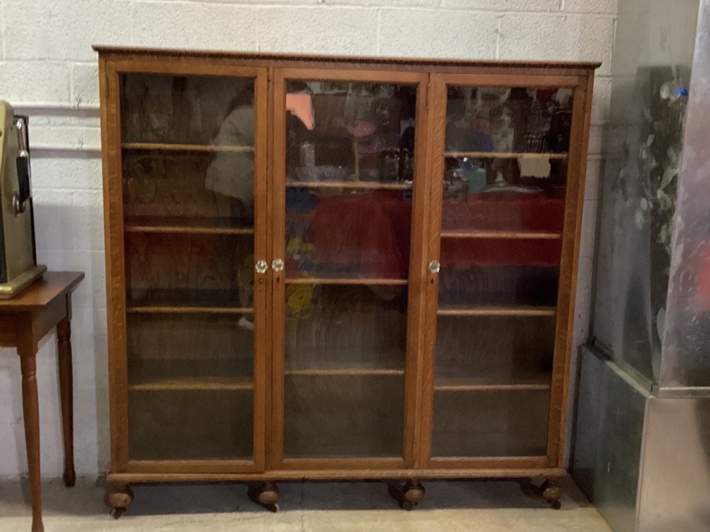 Glass Front Bookcase 58” Tall 69” Wide 15 “ Deep 