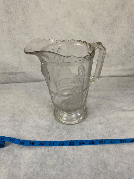 Pressed Glass Pitcher with Historical Motifs