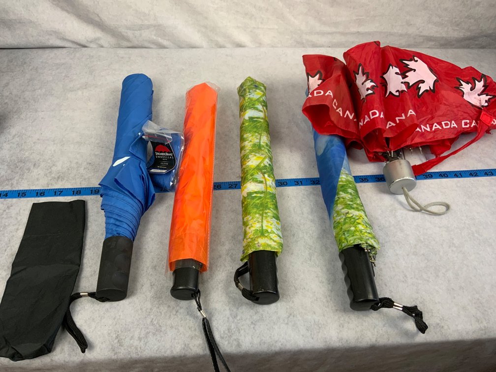 Compact Umbrellas and Canada Flag