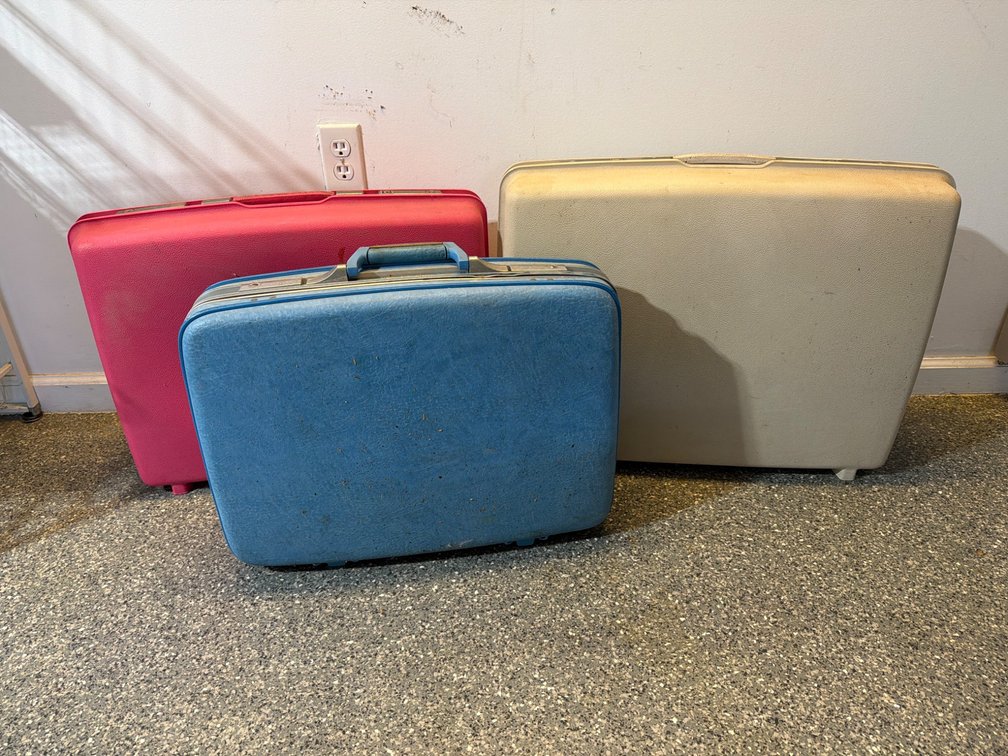 Three Vintage Hard-Shell Suitcases