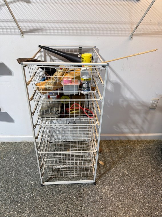 Metal Wire Shelf with Assorted Tools and Supplies