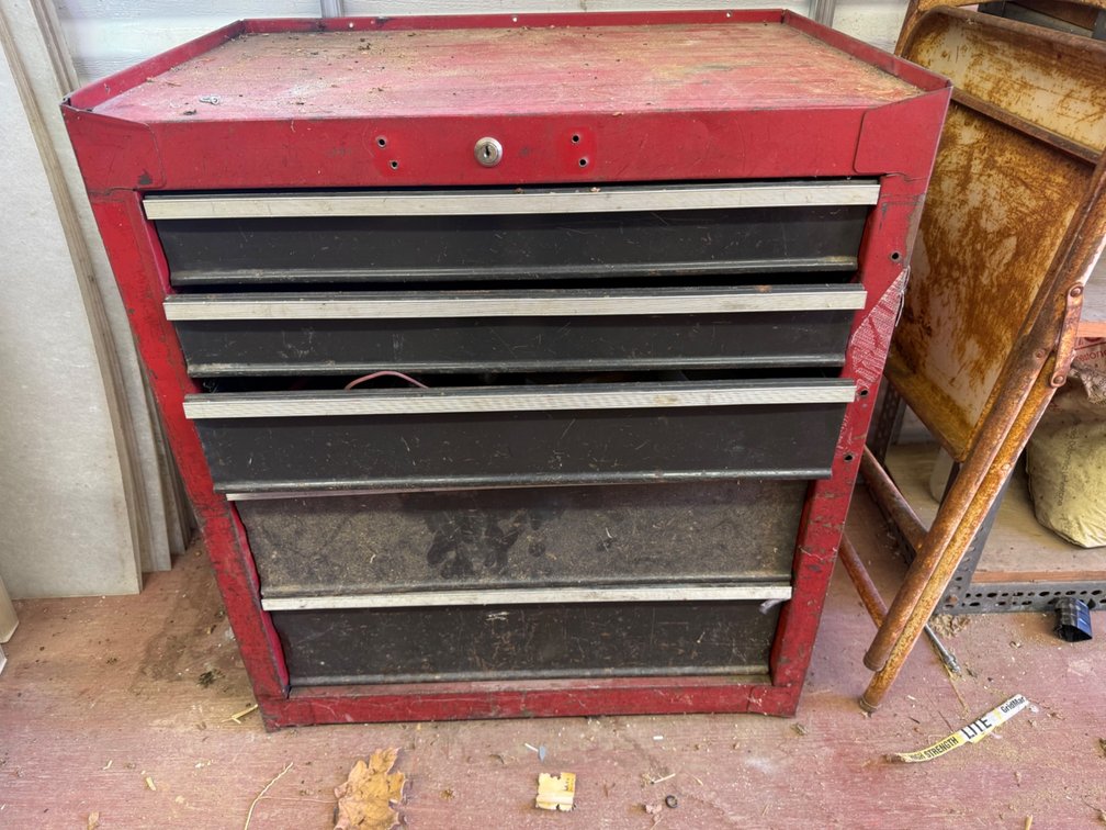 Red Metal Toolbox with Multiple Drawers