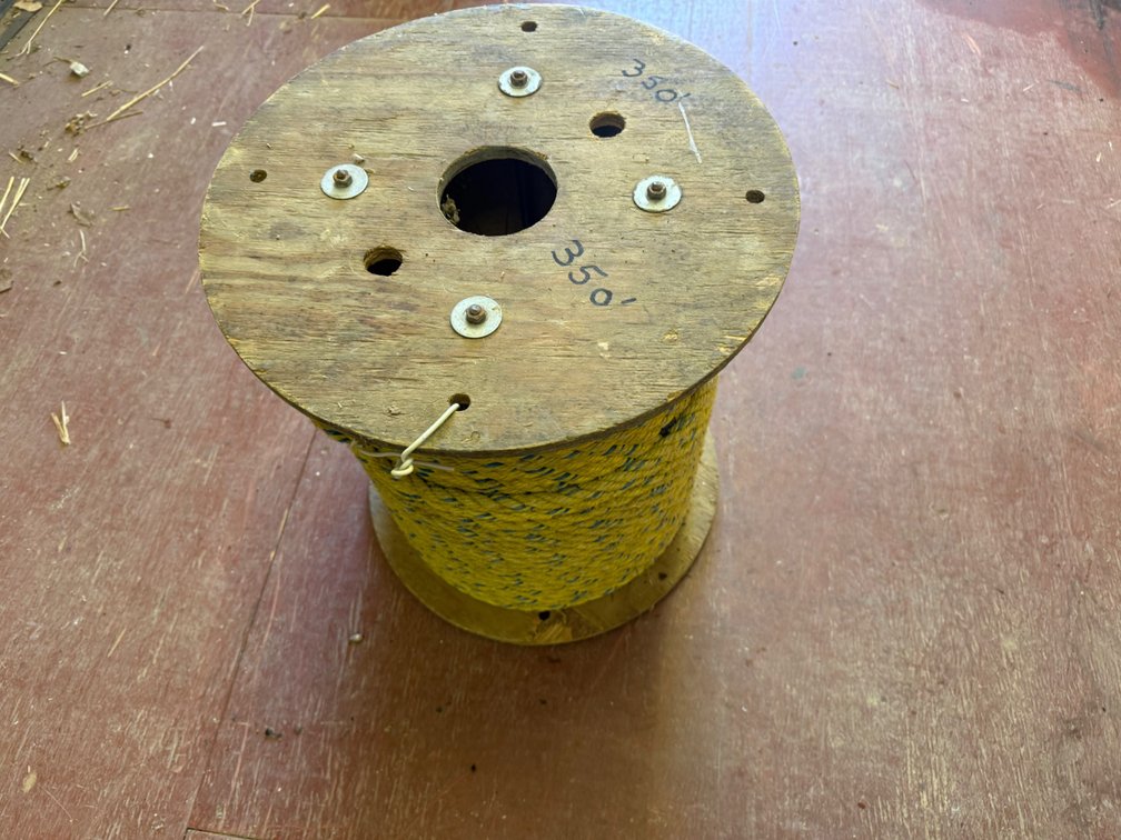 Wooden Spool with Yellow Braided Rope