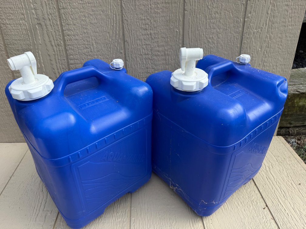 Two Blue Aquatainer Water Storage Containers