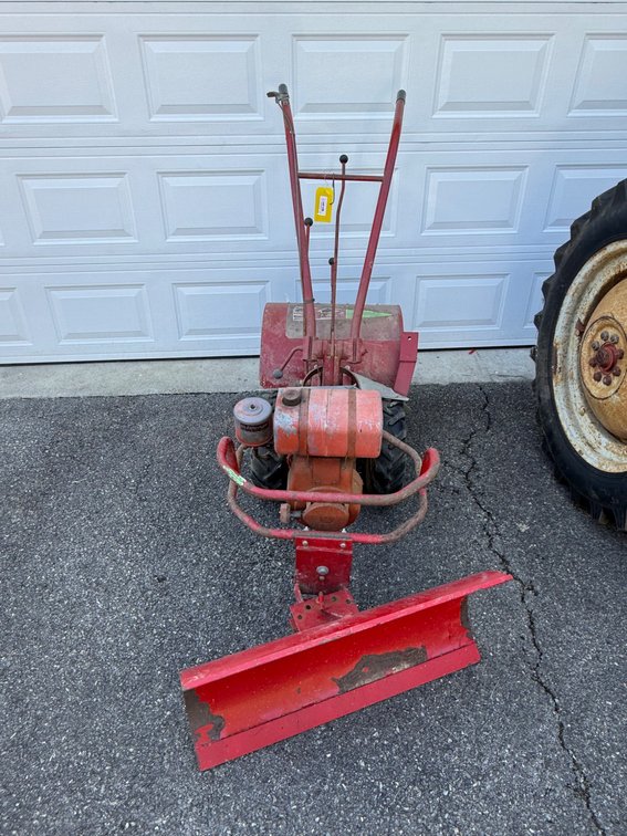Walk-Behind Rototiller with Front Blade Attachment
