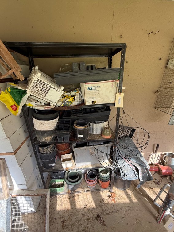 Steel Shelving Unit with Pots and Planters