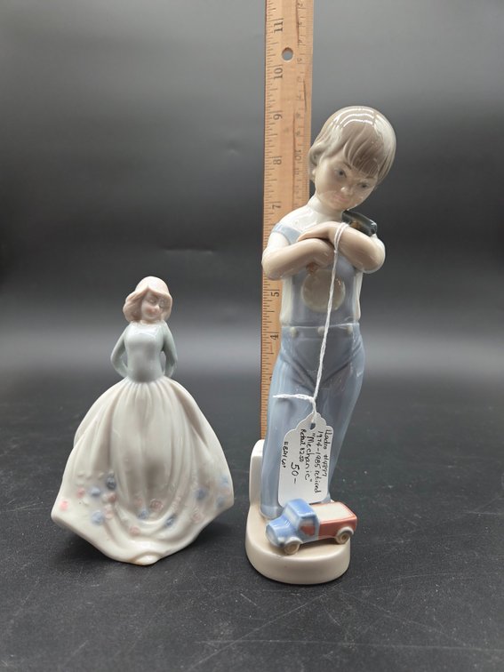 Glazed Porcelain Figurines of Boy and Girl
