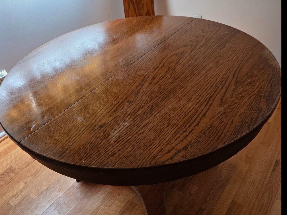 Round Oak Pedestal Dining Table with Extension Leaf