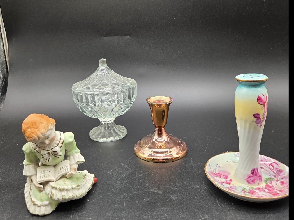 Porcelain Figurine, Pressed Glass Compote, and Metal Candlestick