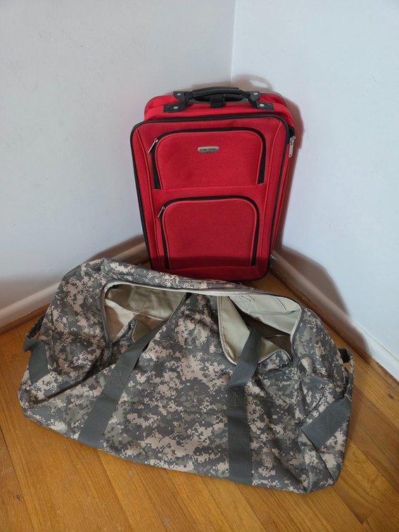 Rolling Suitcase and Digital Camouflage Duffel Bag