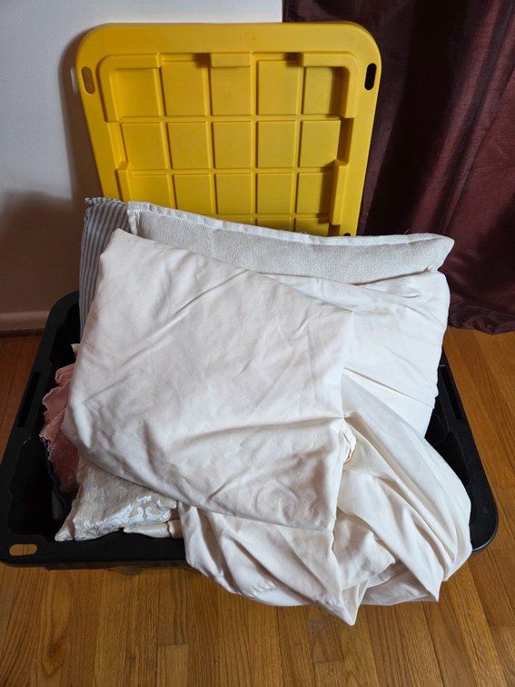 Bedding, Linens, and Throw Pillow in Storage Tote