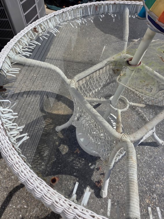 White Wicker Patio Table with Glass Top and Umbrella