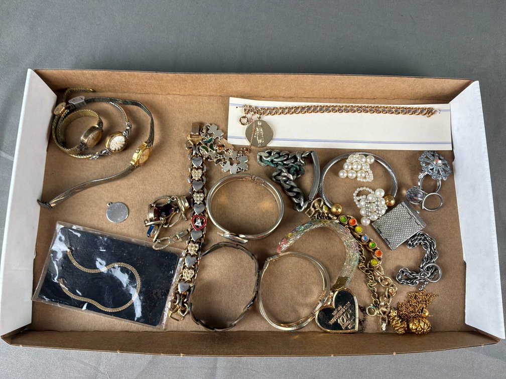 Ladies' Wristwatches, Fashion Bracelets, Rings, and More