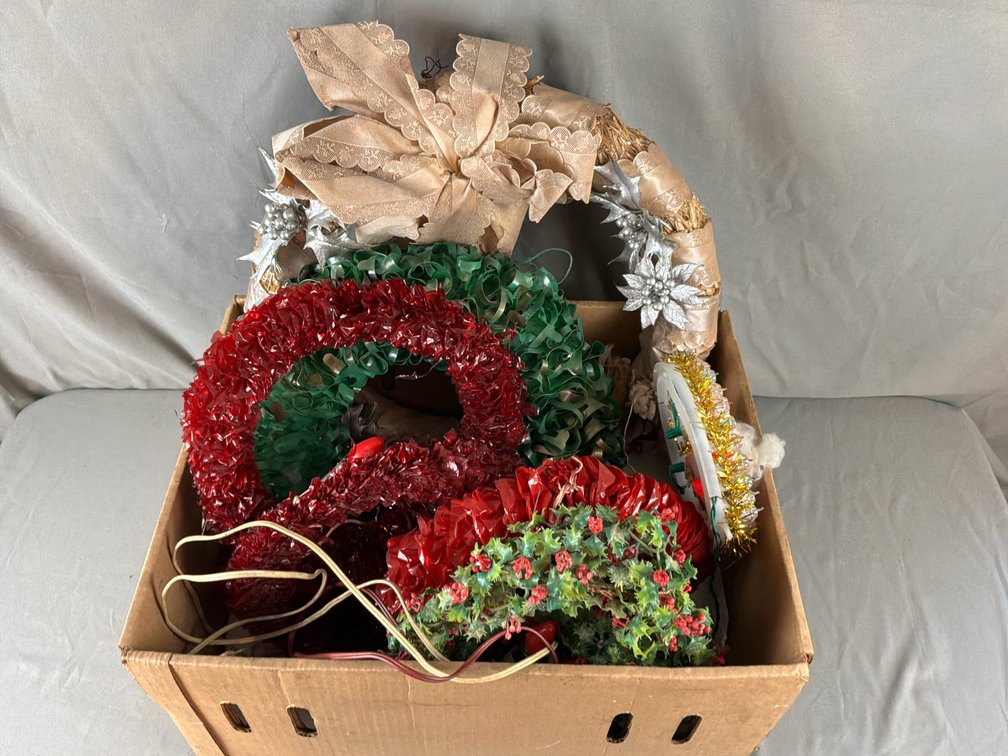 Seven Holiday Wreaths Including Light-Up Santa and Cellophane