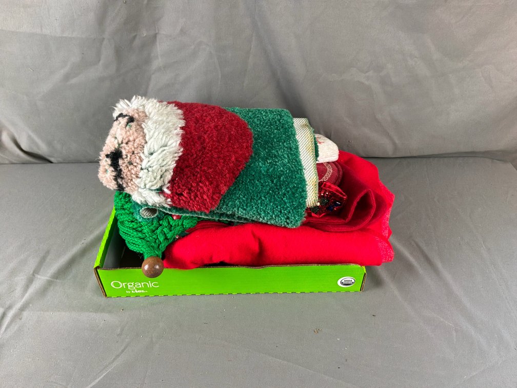 Santa Claus Plush Mat, Green Knit Piece, and Red Fleece Textile