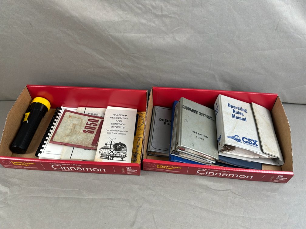 Railroad Operating Rules, Locomotive Manuals, and Flashlight