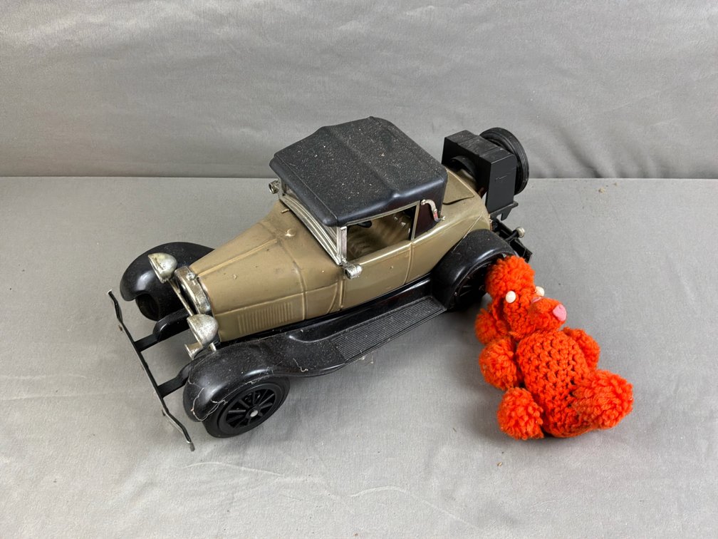 Model Car Decanter and Crocheted Poodle Bottle Cover