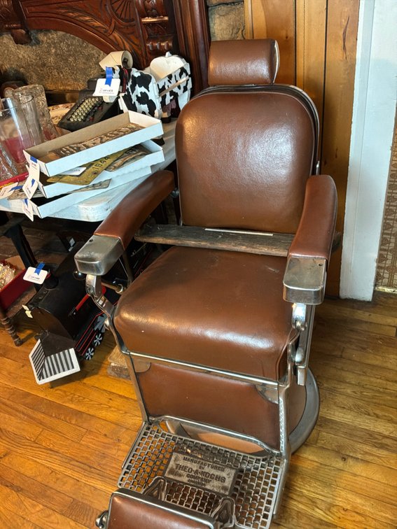 Theo. A. Kochs Barber Chair with Wooden Booster Board