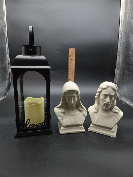 Black Lantern with Flameless Candle and Ceramic Religious Busts