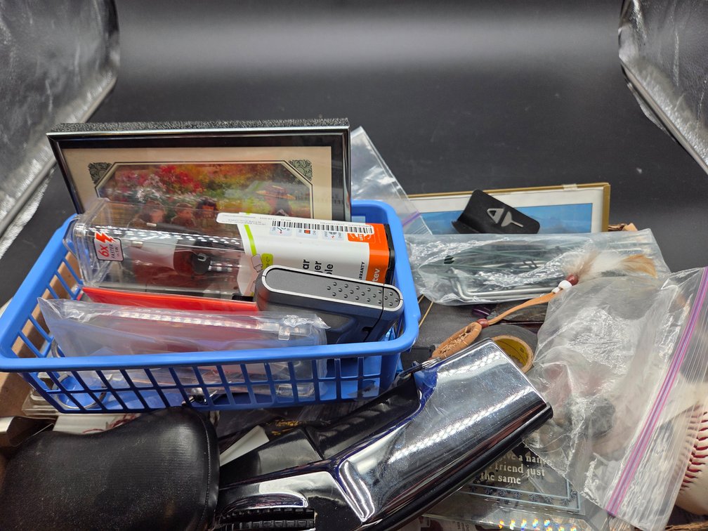 Framed Pictures, Car Charger, Baseball, and Desk Items