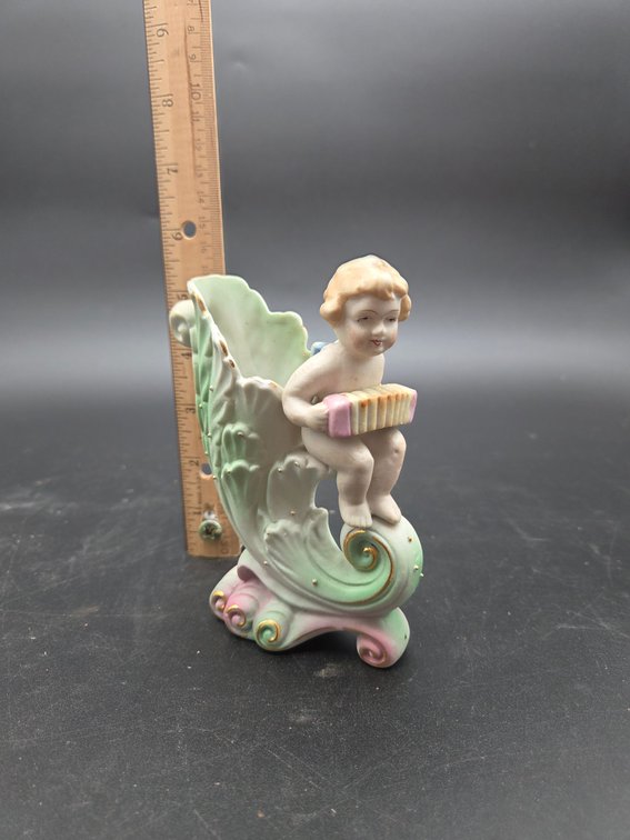 Porcelain Cherub Accordion Cornucopia Vase