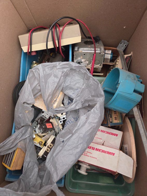 Multimeter, Fish Tape Reel, Conduit Whip, and Electrical Supplies