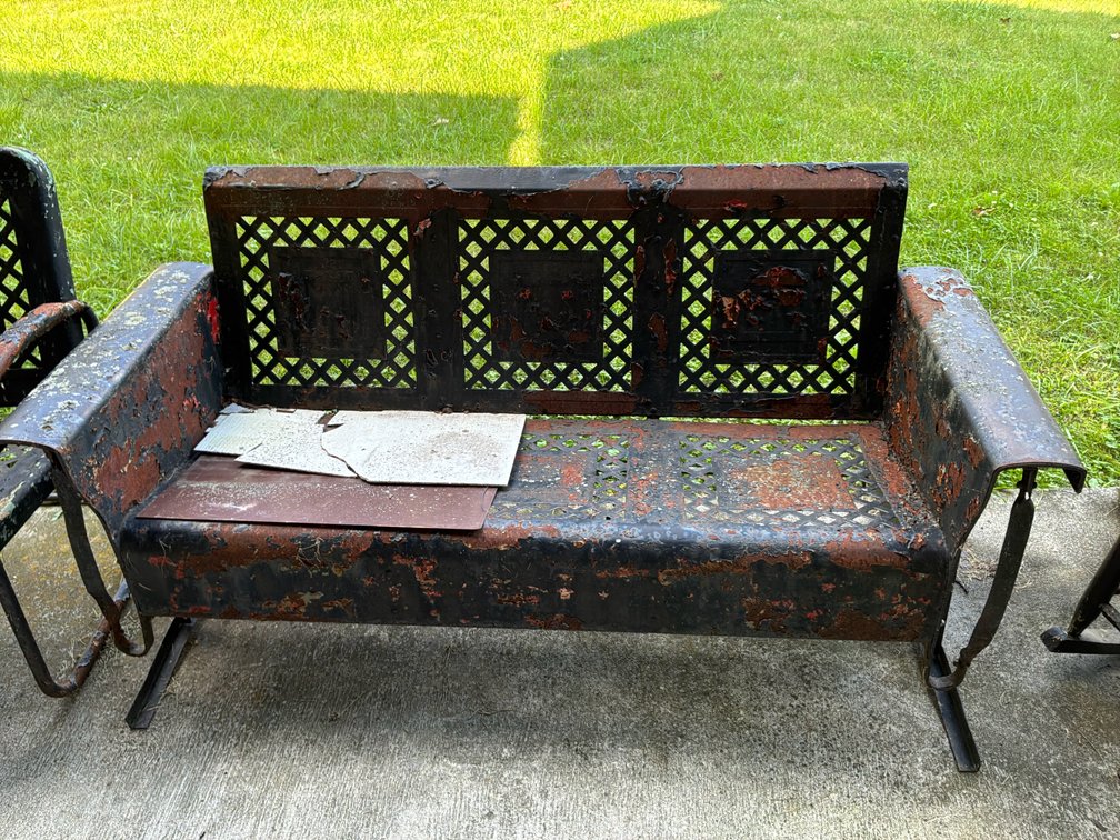 Metal Patio Glider Bench with Open Lattice Panels
