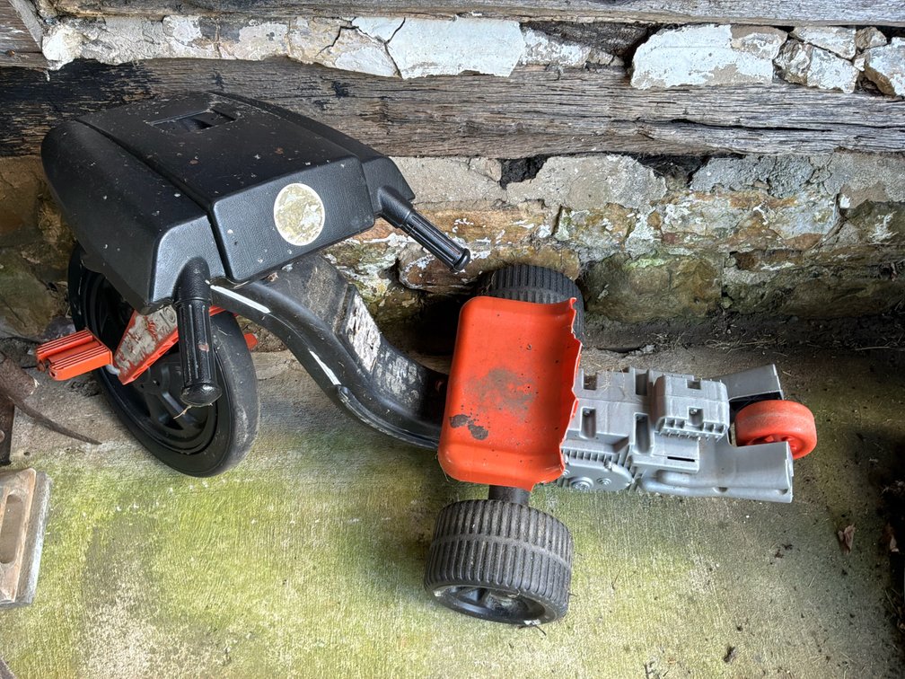 Molded Plastic Ride-On Tricycle with Simulated Engine