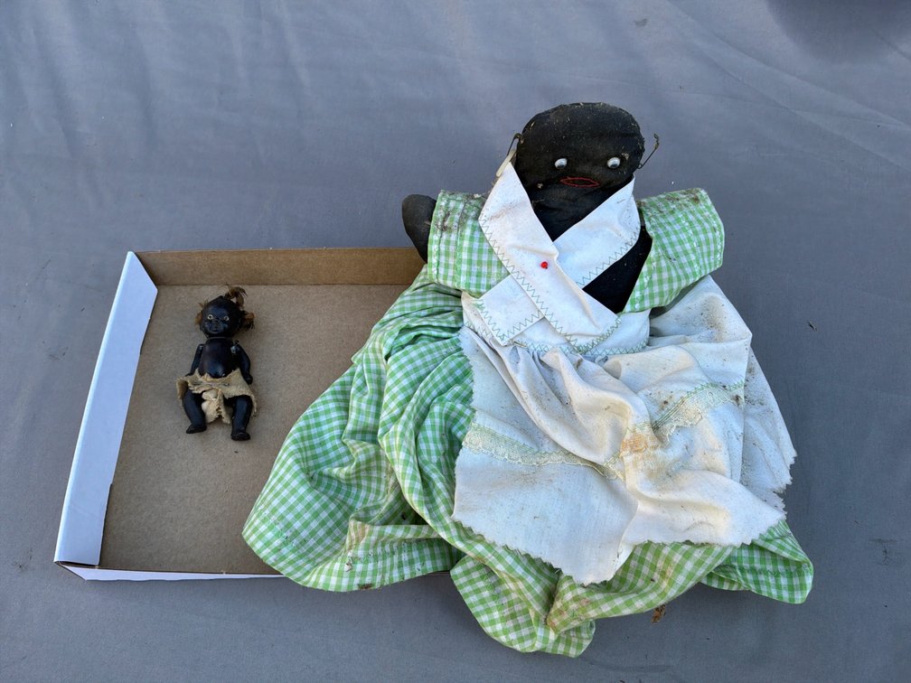 Black Cloth Doll and Miniature Jointed Baby Doll