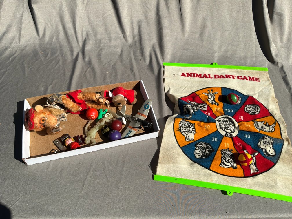 Animal Dart Game, Plush Monkey, Toy Airplane, and More