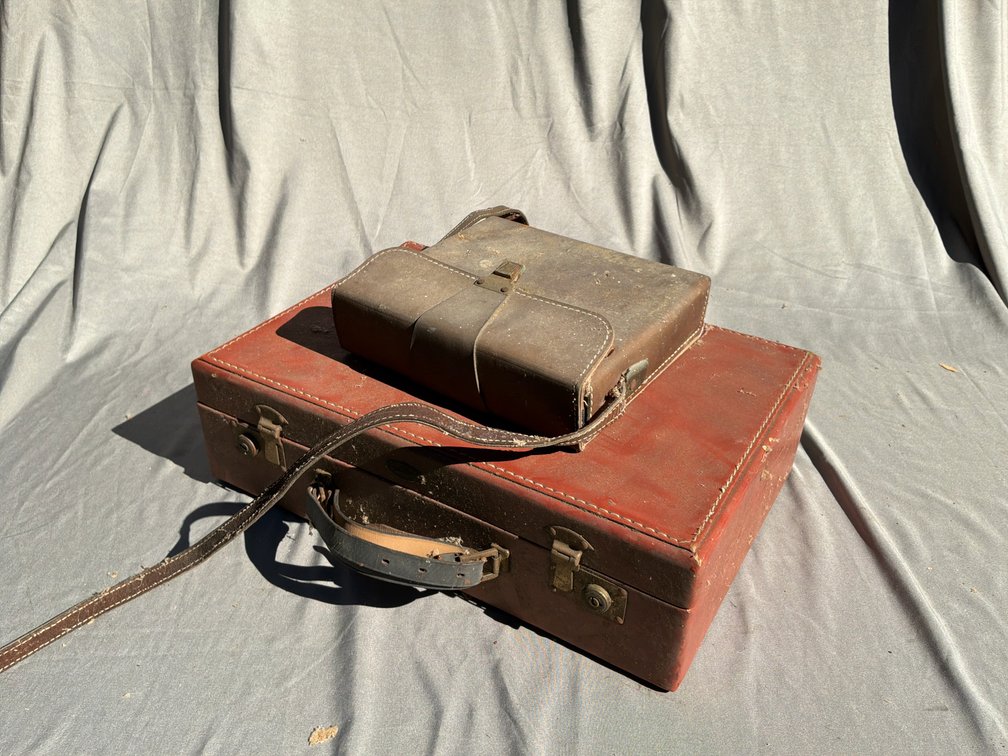 Folding Instant Camera, Baseball Ephemera, and Carrying Cases