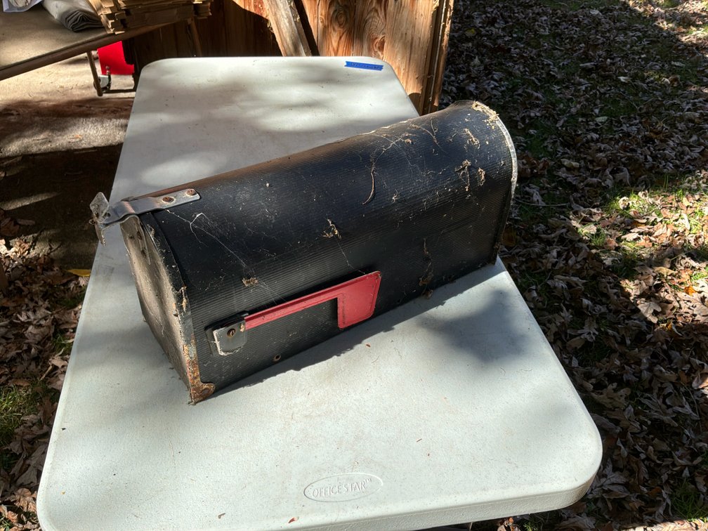 Black Metal Ribbed Rural Mailbox with Red Flag