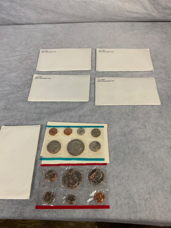 Five U.S. Mint 1973 Uncirculated Coin Sets