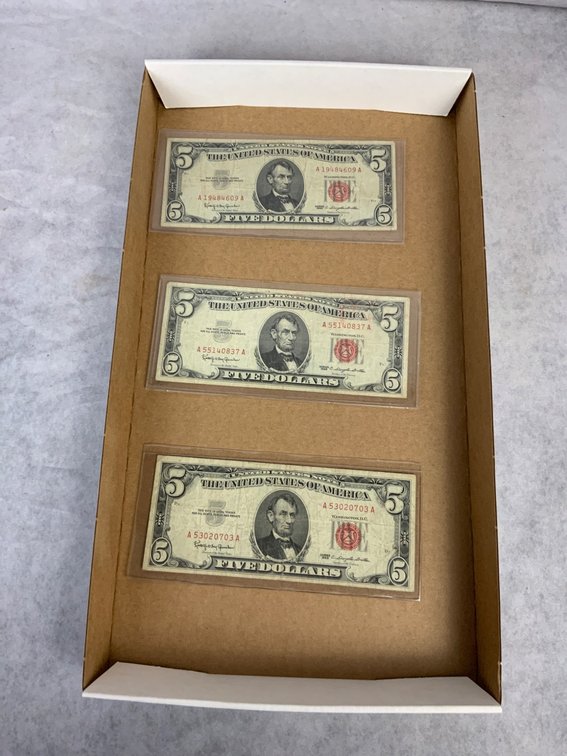 Three 1928 U.S. $5 Red Seal Notes