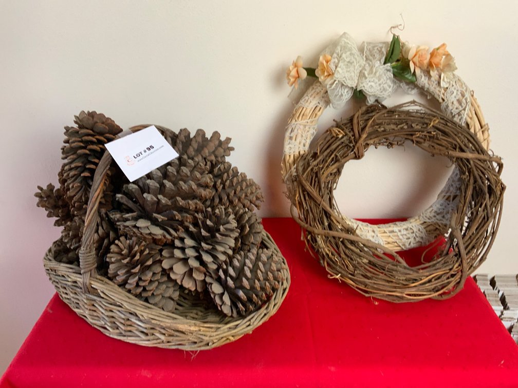 Wicker Basket with Pinecones and Grapevine Wreaths