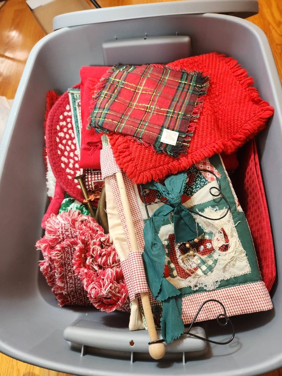 Plastic Tote of Christmas Linens and Decor