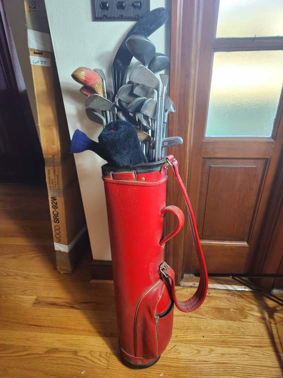 Golf Clubs with Red Bag and Accessories
