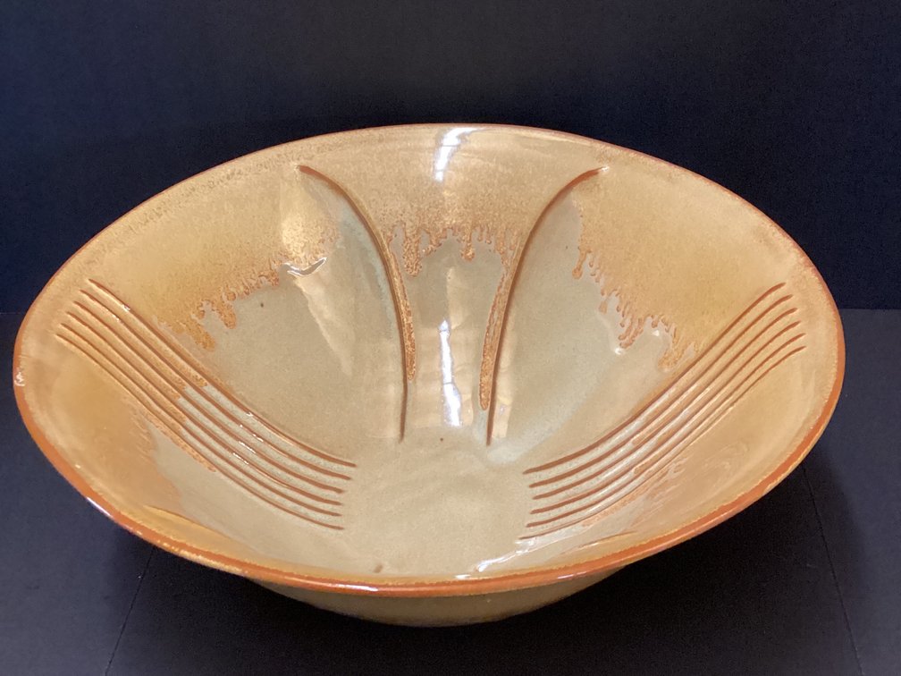 Large golden pottery bowl