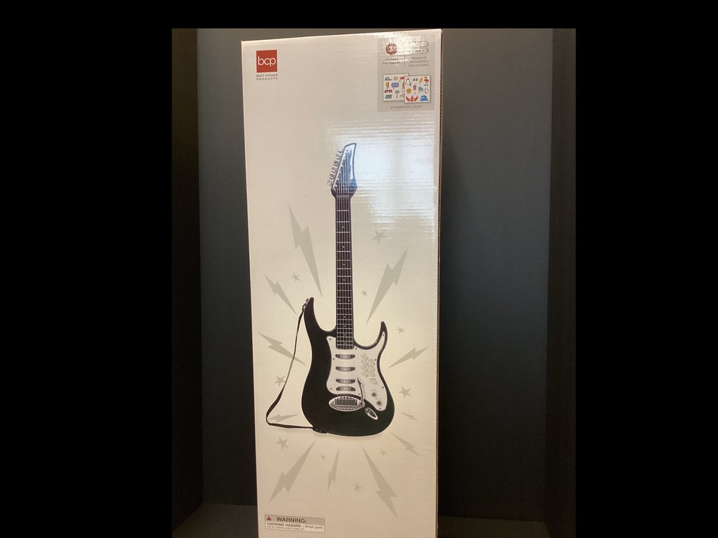 Child’s Electric guitar, amp and microphone