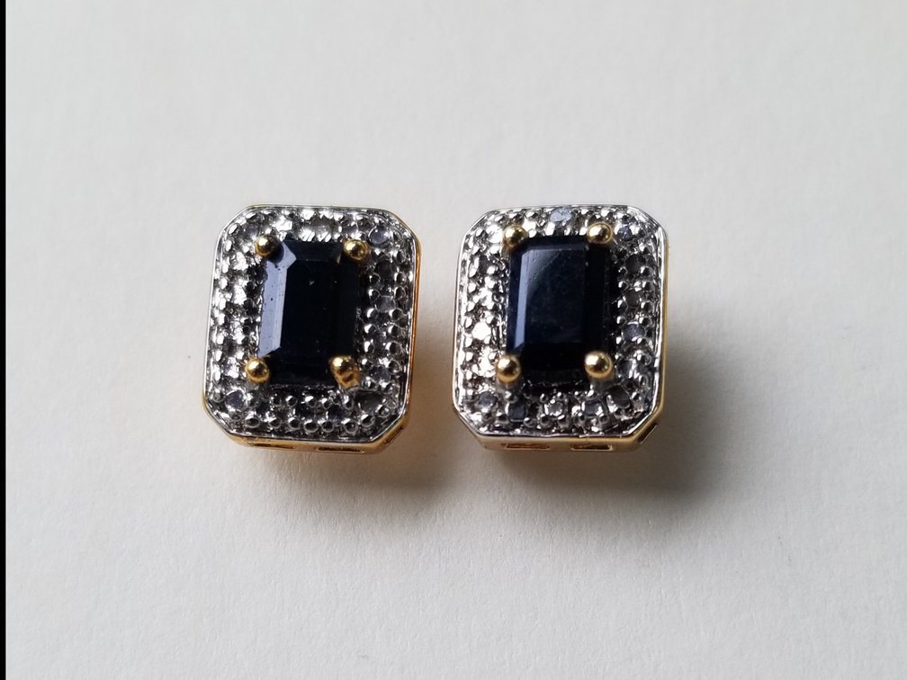 .925 marked earrings with sapphire set stones 