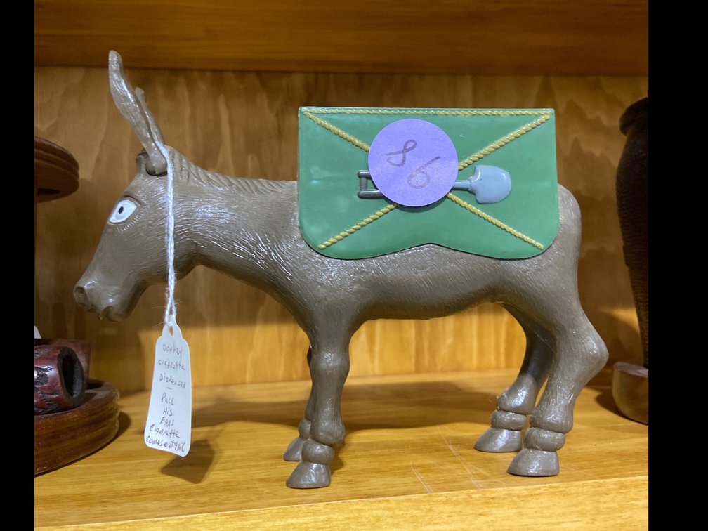 Antique mules cigarette dispenser