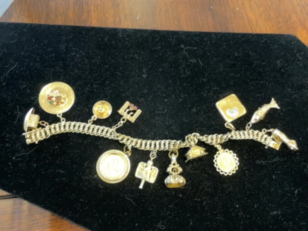 14K Gold Charm Bracelet; Two Charms are gold coins
